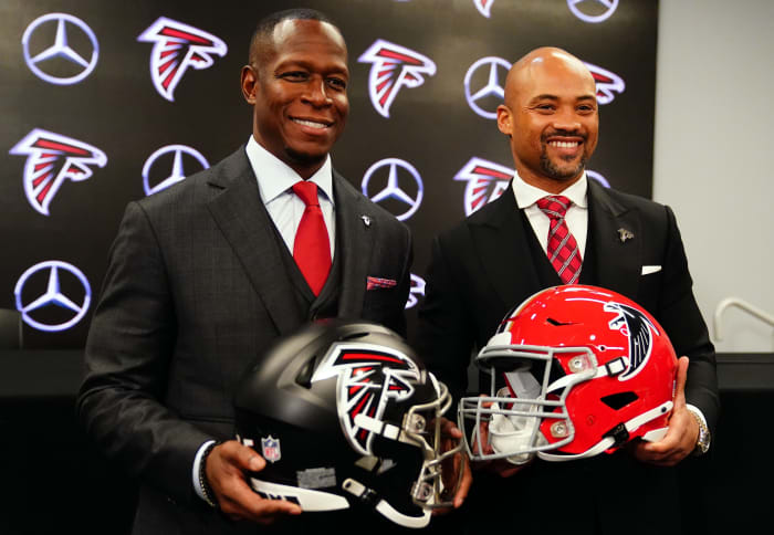Feb 5, 2024; Atlanta, GA, USA; Atlanta Falcons head coach Raheem Morris and general manager Terry Fontenot pose for the media after Morris was introduced as the head coach of the Atlanta Falcons at Mercedes-Benz Stadium.